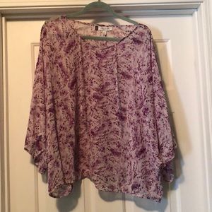 Jennifer Lopez flutter sleeve blouse